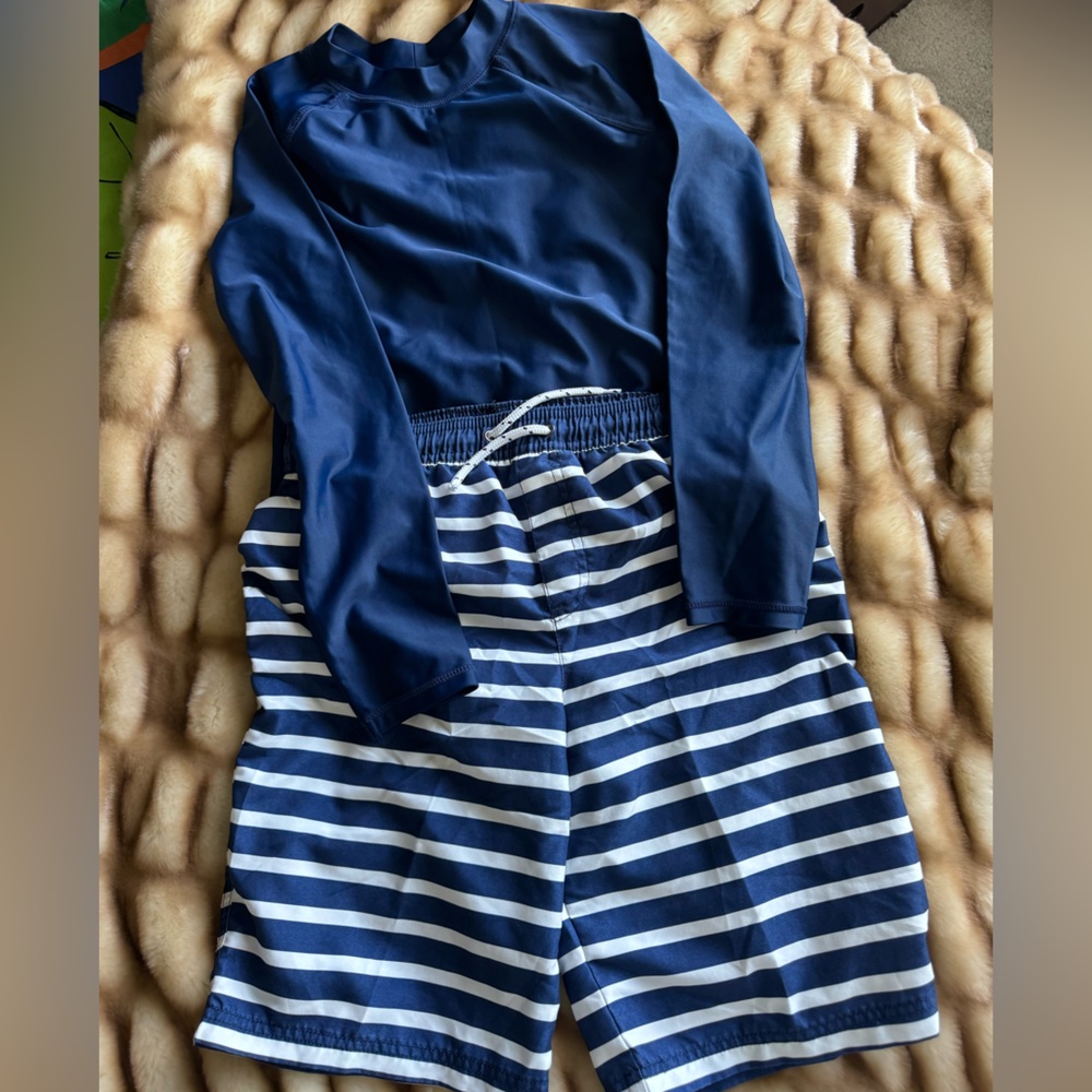 Boys Carters Size 12 rash guard and coordinated swim trunks in blue.